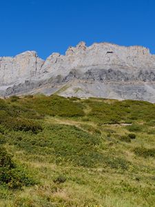 Preview wallpaper rock, relief, valley, grass, landscape