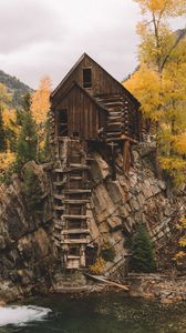 Preview wallpaper rock, river, house, wooden, nature