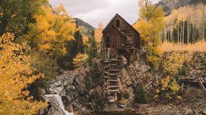 Preview wallpaper rock, river, house, wooden, nature