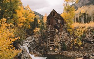 Preview wallpaper rock, river, house, wooden, nature