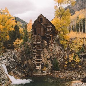 Preview wallpaper rock, river, house, wooden, nature