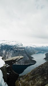 Preview wallpaper rock, river, man, mountains, landscape