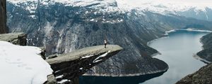 Preview wallpaper rock, river, man, mountains, landscape