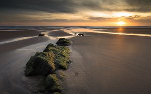 Preview wallpaper rock, sand, sunset, aerial view, landscape