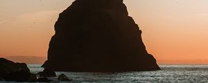 Preview wallpaper rock, sea, coast, water, dusk