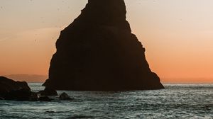 Preview wallpaper rock, sea, coast, water, dusk