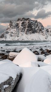 Preview wallpaper rock, sea, coast, snow, waves