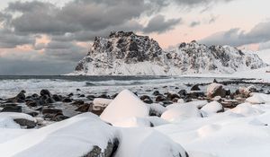 Preview wallpaper rock, sea, coast, snow, waves