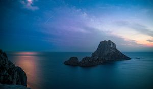 Preview wallpaper rock, sea, evening, sky