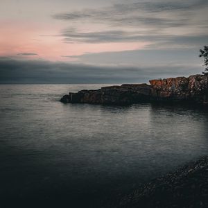 Preview wallpaper rock, sea, evening, nature