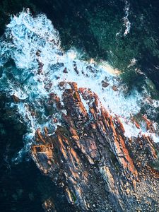 Preview wallpaper rock, sea, foam, aerial view