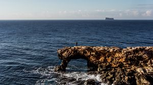 Preview wallpaper rock, sea, horizon, waves, sky