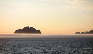 Preview wallpaper rock, sea, horizon, evening