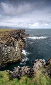 Preview wallpaper rock, sea, stones, landscape, nature, clouds