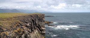 Preview wallpaper rock, sea, stones, landscape, nature, clouds