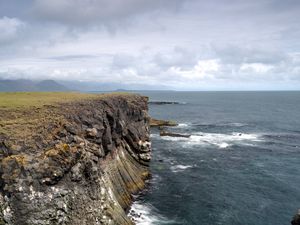 Preview wallpaper rock, sea, stones, landscape, nature, clouds