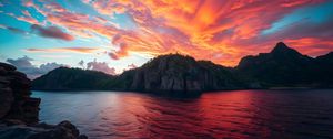 Preview wallpaper rock, sea, sunset, sky, clouds