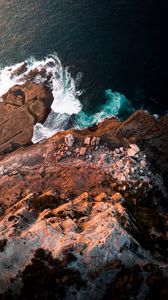 Preview wallpaper rock, sea, surf, cliff, waves, foam