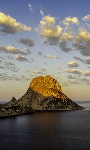 Preview wallpaper rock, sea, water, clouds, twilight, landscape