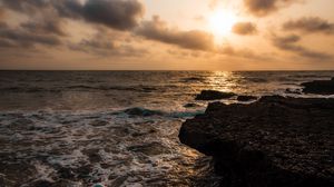Preview wallpaper rock, sea, waves, horizon, sky