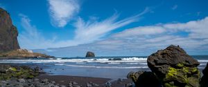 Preview wallpaper rock, sea, waves, foam, shore, pebbles, landscape