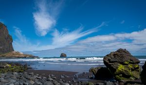 Preview wallpaper rock, sea, waves, foam, shore, pebbles, landscape