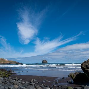 Preview wallpaper rock, sea, waves, foam, shore, pebbles, landscape