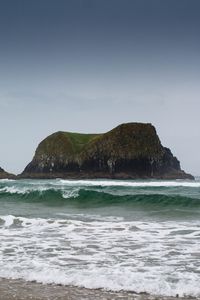 Preview wallpaper rock, sea, waves, foam, shore, landscape