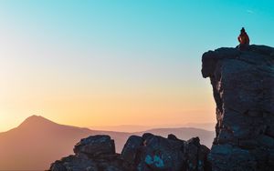 Preview wallpaper rock, silhouette, height, mountains, stone