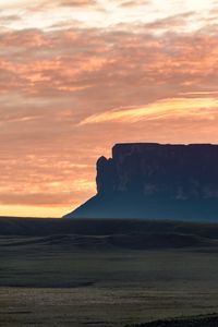 Preview wallpaper rock, silhouette, valley, sunrise