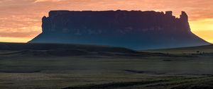 Preview wallpaper rock, silhouette, valley, sunrise