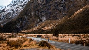 Preview wallpaper rock, slope, road, snow, snowy, fog