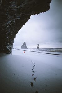 Preview wallpaper rock, snow, lonely, traces, walk