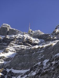 Preview wallpaper rock, snow, relief, tower, sky