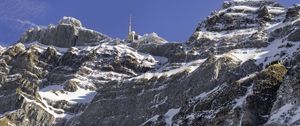 Preview wallpaper rock, snow, relief, tower, sky