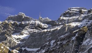 Preview wallpaper rock, snow, relief, tower, sky