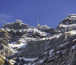 Preview wallpaper rock, snow, relief, tower, sky