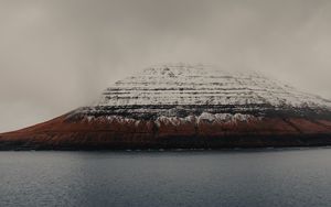 Preview wallpaper rock, snow, snowy, sea, grass