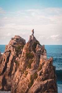 Preview wallpaper rock, solitude, alone, man, ocean, indonesia