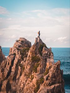 Preview wallpaper rock, solitude, alone, man, ocean, indonesia