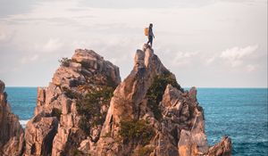 Preview wallpaper rock, solitude, alone, man, ocean, indonesia