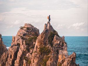 Preview wallpaper rock, solitude, alone, man, ocean, indonesia