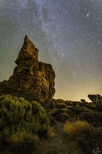 Preview wallpaper rock, stars, sky, night, landscape, nature