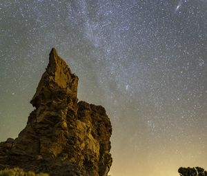 Preview wallpaper rock, stars, sky, night, landscape, nature