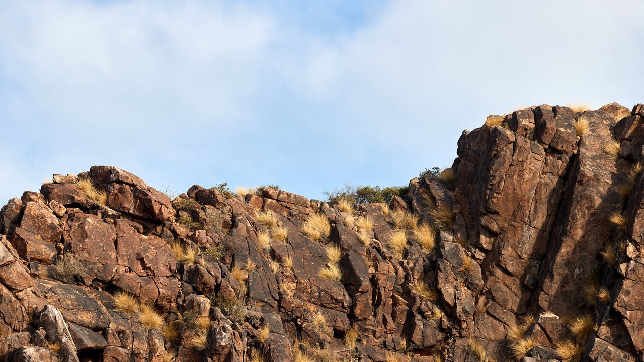 Wallpaper rock, stone, bushes, sky