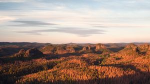 Preview wallpaper rock, stone, forest, relief, horizon