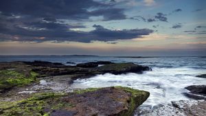 Preview wallpaper rock, stone, sea, sunset, sky
