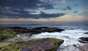 Preview wallpaper rock, stone, sea, sunset, sky