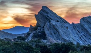 Preview wallpaper rock, stone, stony, trees, sunset
