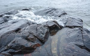Preview wallpaper rock, stone, water, waves, sea